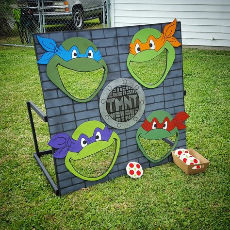 Ninja Turtles Birthday Party  I made this game, "Feed the Turtles" for my nephew's birthday party  :) Ninja Turtle Cornhole, Ninja Turtles 1st Birthday Party Ideas, Pin The Mask On The Ninja Turtle, Ninja Turtles Birthday Party Activities, Ninja Turtles Party Games, Ninja Turtle Games For Party For Kids, Ninja Turtle Birthday Party Games, Ninja Turtle 2nd Birthday, Ninja Turtles Birthday Party Games