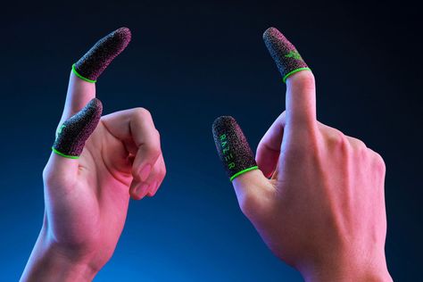 Razer made gamer thimbles - The Verge Razer Gaming, Finger Sleeve, Controller Design, Toasters, Gloves Design, Make A Game, Wireless Charging Pad, Gaming Clothes, Smartphone Case