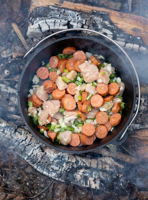 Easy one-pot Jambalaya made over a campfire - Thor Industries Campfire Stuffed Peppers, Soups Over Campfire, Campfire Jambalaya, Campfire Jambalaya Recipe, Dutch Oven Jambalaya Recipe, Jalapeno Rice, Fire Meals, Camper Meals, Campfire Dutch Oven Recipes