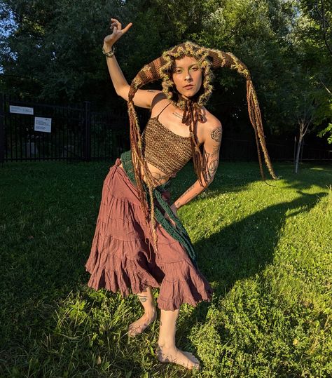 crochet forest jester hat I made for alexia! made to look overgrown with moss. top and green hip scarf also made by me #clown #renfaire #crochetinspiration #jestercosplay #costumedesign Ren Faire Clown, Crochet Ren Faire Ideas, Jester Ren Faire, Ren Faire Ideas, Renfaire Crochet, Jester Hat Crochet, Crochet Jester Hat, Renfaire Outfit Jester, Jester Hat Pattern