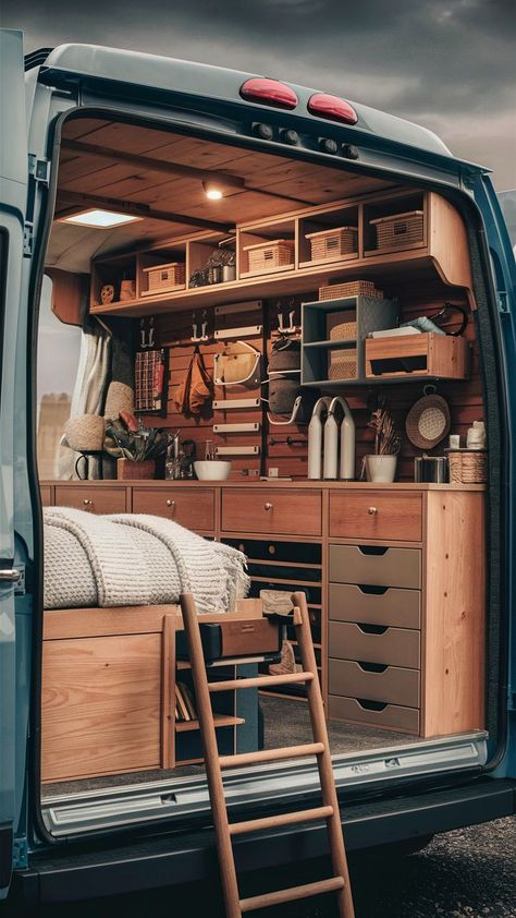 A compact gear wall with efficient storage and table flips in a DIY van conversion. Van Conversion Walls, Table Flips, Gear Wall, Coffee Van, Table Flip, Travel Camper, Trailer Storage, Workbench Plans Diy, Suv Camping