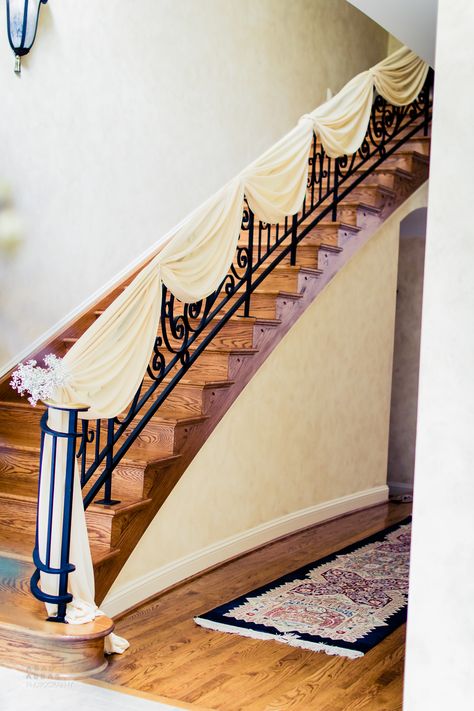 Draping and elegant florals on stairs for a Nikah held at home! #sarahkhaneventstyling #draping #stairs #dcwedding #vawedding #mdwedding #indianwedding #bengaliwedding #pakistaniwedding Stairwell Decor, Castle Staircase, Mendhi Ideas, Wedding Stairs, Hatley Castle, Purple Wedding Bouquets, Diy Diwali Decorations, Mehndi Decor, Bengali Wedding