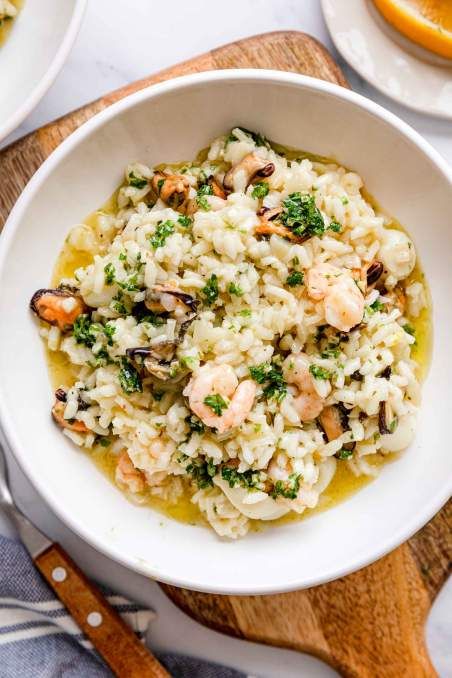 Seafood Risotto is a simple recipe made in one pan using fresh or frozen seafood mix like shrimp, mussels, and squid. A beautiful family meal for all seasons and busy weeknights. It takes about 40 minutes to make, and it’s great for beginner cooks too. #seafoodrecipes #risotto #seafood risotto #weeknightfamilymeal #familymeal #jernejkitchen Frozen Seafood Mix Recipes, Frozen Mussels Recipe, Risotto Seafood, Seafood Medley Recipes, Mixed Seafood Recipe, Seafood Medley, Seafood Risotto, Seafood Mix, Mussels Recipe