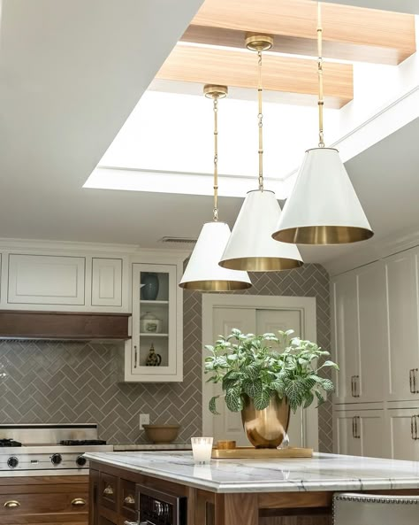 rebecca gibbs on Instagram: “We added personality and light to this remodel by making this skylight much larger and adding beams with pendants suspended from them. 🤍🤍🤍…” Skylights With Pendants, Kitchen Skylight Flat Ceiling, Chandelier In Skylight, Skylight With Beams, Skylight Over Kitchen Island, Skylights Over Kitchen Island, Interior Skylight Design, Skylight With Pendant Light, Kitchen With Skylight Natural Light