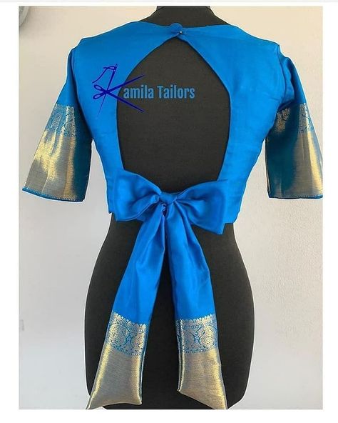 trendy blouse idea's on Instagram: “Follow - @trendy_blouses_ for Saree blouse inspiration Designer:@kamilatailors Dm for credits/removel😊 Tag @trendy_blouses_ to get…” Blouse Bow Designs Indian, Blouse Designs Latest Back, Blouse Degine, Trendy Blouse Patterns, Bavariya Work, Simple Blouse Pattern, Blouse Designes, Blouse Inspiration, Lengha Blouse Designs