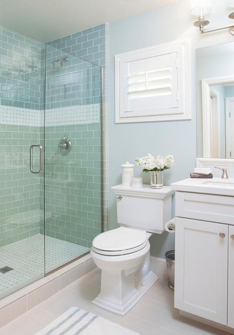 Blue cottage bathroom features a walk-in shower clad in blue subway tiles accented with marble ... Room View, Cottage Bathroom, Mediterranean Blue, Bathroom Reno, Basement Bathroom, Bathroom Tiles, Dream Bathrooms, Bathroom Remodel Master, Bath Remodel