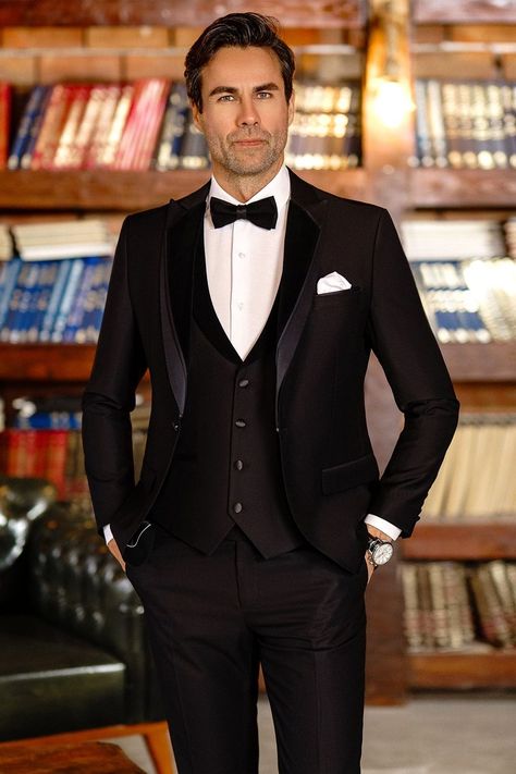 Unleash your inner James Bond with the Black Slim-Fit Tuxedo 3-Piece, a nod to the iconic elegance of Hollywood's golden age. With its tailored perfection and subtle yet striking details, this ensemble is your license to thrill, promising an evening of intrigue, romance, and unforgettable moments.

#suit #suits #eveningattire #menattire #styleinspiration #menstyle #gentleman #tuxedo #blacktuxedo Blazer Waistcoat, Cute Tuxedo, Mens Tuxedo, Double Breasted Tuxedo, Suit Stores, Suit Styles, Slim Fit Suit Men, Slim Fit Tuxedo, Lapel Jacket