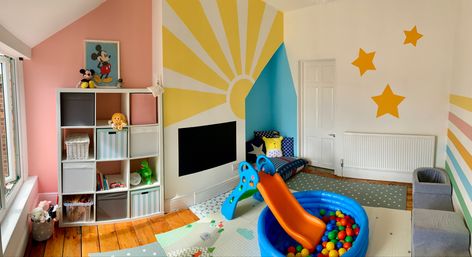 Colourful Playroom Ideas, Purple Playroom, Playroom Paint Ideas, Daycare Mural, Playroom Mural Ideas, Orange Playroom, Colorful Playroom Ideas, Playroom Color Scheme, Yellow Kids Bedroom