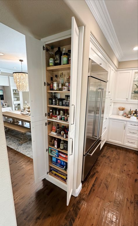 We made a spice cabinet from a hollow wall in our remodeled kitchen. Kitchen Full Wall Cabinets, Wall Spice Cabinet, Built In Pantry Cabinet Wall, Coastal Kitchen Remodel, Lake Kitchen, Hollow Wall, Open Kitchen And Living Room, Built In Pantry, Kitchen Cabinets And Countertops