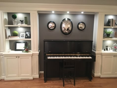 Built Ins Around Piano, Closet By Front Door, Tv Above Piano, Dining Room Turned Library, Piano Sitting Room, Piano Decorating Ideas, Bench By The Window, Cozy Library Room Ideas, Piano Nook