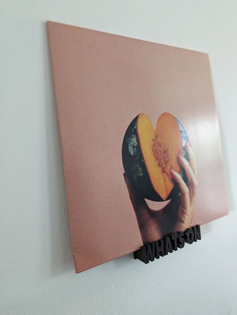 A 3D printed wall mounted record hanger Record Holder Wall, Vinyl Holder, Vinyl Record Holder, Record Holder, Remote Work, Marketing And Advertising, Etsy App, Selling On Etsy, Sell On Etsy