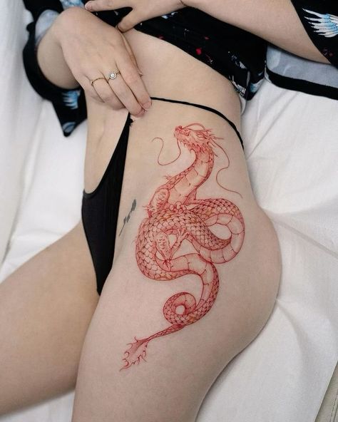 Red Words Tattoo, Red Dragon Tattoo Men, Red Dragon Tattoo Thigh, Dragon Tattoo Red And Black, Red Dragon Tattoo For Women, Dragon Red Tattoo, Red Patchwork Tattoos, Dragon Tattoo Lower Back, Eastern Dragon Tattoo