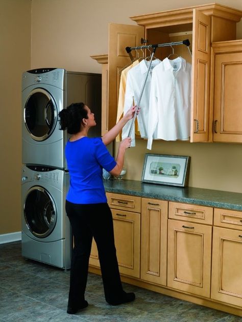 retractable drop down hanging rack...just push up and close the doors so you don't see the clothes hanging around drying Organizer Wardrobe, Traditional Laundry Room, Laundry Room/mud Room, Pantry Laundry Room, Pantry Laundry, Closet Rods, Laundry Room Renovation, Clothes Rod, Clothes Hanging