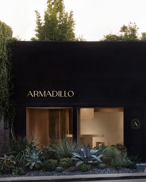 Hello, LA. Our new flagship has an alluring landscaped façade that gives way to an elegant interior inspired by the soft tones and textures of high-end fashion ateliers. As a certified @bcorporation, integrating sustainable elements was also a given - this is our fourth showroom to run on 100% renewable energy. Luxury Clothing Store, Armadillo Rug, Garden Line, Clothing Store Interior, Creative Hub, Curved Walls, Blackened Steel, Shop Fronts, Head Office