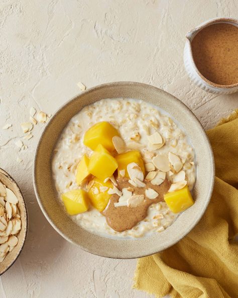 Tropical Mango Porridge - amelia freer Healthy Porridge Recipes, Healthy Porridge, Amelia Freer, Mango Oatmeal, Coconut Milk Drink, Healthy Skin Diet, Fancy Breakfast, Veggie Breakfast, Skin Diet