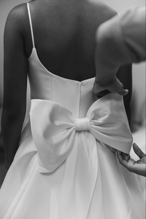 wedding dress bow wedding details dress inspo bridal look Short Bow Back Wedding Dress, Black Bow Wedding Dress, Bow Behind Dress, White Wedding Dress With Bow, High Neck Wedding Dress With Bow, Bow Detail Wedding Dress, Short White Dress With Big Bow, Big Bow On Dress, Mini Wedding Dress With Bow