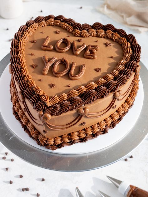 This heart shaped chocolate cake recipe makes two, tender cake layers that are frosted with homemade chocolate buttercream. Heart Shaped Birthday Cake, Chocolate Heart Cakes, Heart Shaped Cake Pan, Cake Wallpaper, Chocolate Cake Designs, Heart Cakes, Heart Shaped Chocolate, About Heart, Chocolate Buttercream Frosting