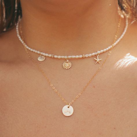 embrace your beachy vibes with the Golden Hour necklace🌞🌊 #pearlnecklace #handmadejewelry #goldjewelry #handcraftedjewelry #smallbusinessowner #goldfilledjewelry #oceanjewelry #jotd #jewelryinspiration #surfjewelry Beachy Necklaces, Beachy Necklace, Surf Jewelry, The Golden Hour, Beachy Vibes, Ocean Jewelry, Jewelry Essentials, Gold Filled Jewelry, Golden Hour