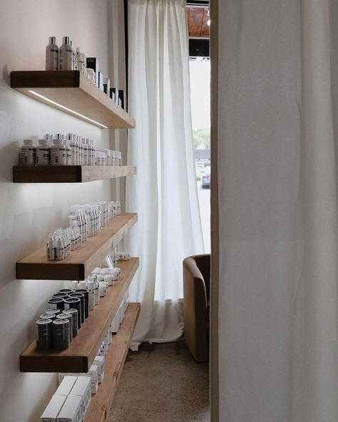 Loving this sleek and organized product display – so clean and chic! ✨ #shelfdisplay #minimalistdecor #floatingshelves Salon Retail Display Ideas, Pine Floating Shelves, Salon Retail Display, Retail Shelves, Custom Floating Shelves, Wooden Brackets, Led Recessed Lighting, Custom Shelving, Rustic Floating Shelves