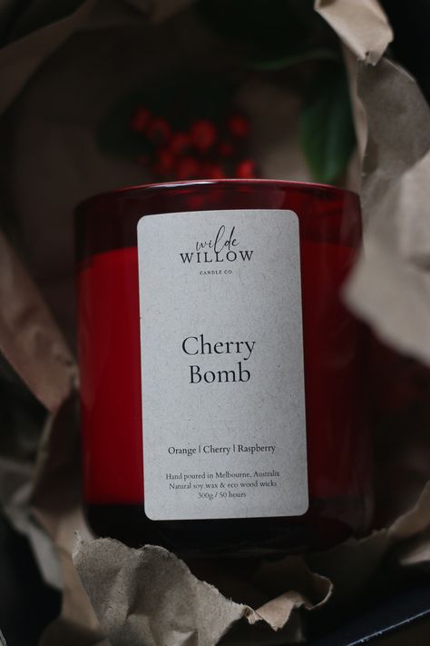 Our candles are individually handcrafted, filled with 100% soy wax. Each glass is finished with a natural, wood wick and when properly burned, can last up to 50 hours.  Scent: Cherry Bomb Scent Notes: A delightfully sweet, spiced and sensual fragrance of juicy cherries warmed with bitter almond and vanilla. Top notes are orange and raspberry; middle notes are almond, cherry and heliotrope; base notes are cinnamon, nutmeg and vanilla. Material: Glass Wax: 100% Soy Wick: Wood. These make a relaxin Cherry Scent, Cherry Candle, Log Fires, Room Scents, Cherry Bomb, Candle Wax Melts, Dream House Decor, Candle Containers, Burning Candle