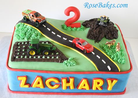 2nd birthday cake.....road with cars, train tracks with train, and either a construction site or airport instead. Transportation Birthday Cake, Cake Car, Tractor Cake, Transportation Party, Fig Cake, Cars Birthday Cake, Cake Table Birthday, Transportation Birthday, Truck Cakes