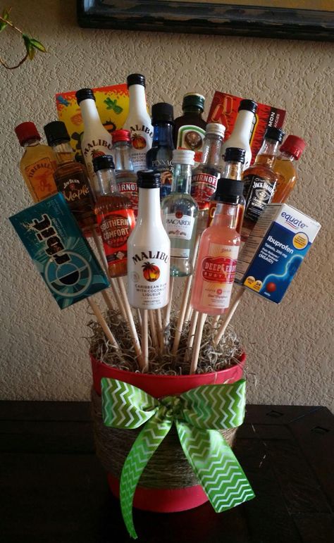 Liquor bouquet for white elephant gift. You can't go wrong. Liquor Bouquet, White Elephant Gift Ideas, Elephant Gift Ideas, Liquor Gifts, Raffle Baskets, Diy Gift Baskets, Christmas Gift Basket Ideas, White Elephant Gift, Alcohol Gifts