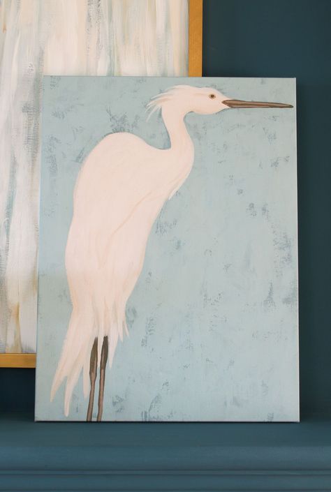 A Source for Coastal Art on a Budget! Check out this gorgeous Heron canvas art print - also available in larger sizes and even as a wall mural! This would make THE most perfect coastal mural for any coastal space. Love the modern coastal vibes of this piece. Here it looked great as layered art on a blue painted fireplace with turquoise accents. This blue fireplace with pops of turquoise and coastal wall art looks perfectly summery! Art For Coastal Homes, Coastal Wall Mural, Diy Coastal Wall Art, Abstract Coastal Art, Blue Painted Fireplace, Coastal Mural, Blue Fireplace, Painted Fireplace, Large Scale Wall Art