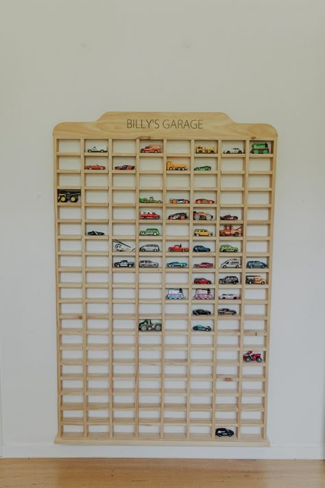 Keep that car collection tidy & organised. Our Matchbox storage is the perfect addition to your little ones bedroom, or toy room, and makes clean up time not so boring. For that extra special touch, add personalisation (enter above, if not selected there will be no wording on it). Hang it on the wall, or have it free standing (in this case we recommend it is fixed to the floor or the wall to ensure safety). We can make it any size, or shape. Click here for a custom quote. Handmade individually w Playroom Car Storage, Toy Car Garage Ideas, Toy Car Organization Ideas, Boy Car Bedroom, Car Shelves For Kids, Diy Car Storage For Kids, Race Car Theme Room, Boys Cars Bedroom, Car Bedroom Ideas