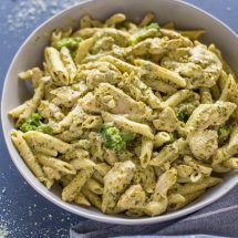 Easy 20 minute Pesto Chicken and Broccoli Pasta Prep Time10 minutes Cook Time15 minutes Total Time25 minutes Servings4 AuthorLaylaIngredients1 tablespoon olive oil1/2 onion minced4 cloves garlic minced2 chicken breasts sliced into ½ inch strips1 cup light cream or half and half1/4 grated parmesan cheese1/4 cup pesto1/2 teaspoon salt1/4 teaspoon pepper or to taste4 cups aldente pasta drained (appx)1 cup broccoli florets frozen or freshInstructionsBegin by cooking the pasta in a Creamy Pesto Chicken, Creamy Pesto Chicken Pasta, Pasta Creamy, Costco Meals, Chicken Fettuccine, Creamy Pesto, Broccoli Pasta, Pesto Chicken Pasta, Pesto Chicken