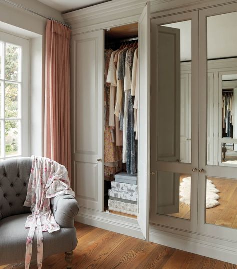 The clients chose two opposing sets of closed storage to cater to various wardrobe needs, offering a versatile mix of hanging options. Whether long rails for dresses and coats or shorter spaces for blouses and shirts, every garment finds its designated spot, ensuring both care and accessibility. Elegant Dressing Room, Bedroom And Dressing Room, Hotel Style Bathroom, Sliding Bathroom Doors, Elegant Dressing, Boot Room, Kitchens And Bedrooms, Bedroom Wardrobe, Utility Rooms