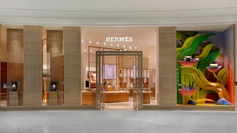 Hermès Unveils New Store in Doha’s Place Vendôme Mall – WWD Hermes Store, Parisian Architecture, Mall Stores, Embossed Wallpaper, Luxury Marketing, Dubai Mall, Store Front, Doha, Retail Design