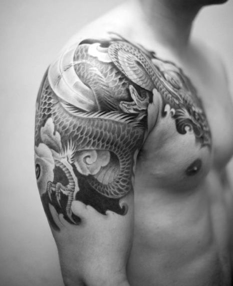 Men's Japanese Sleeve Tattoo Designs Dragon Tattoo Shoulder, Japanese Tattoos For Men, Dragon Tattoos For Men, Dragon Sleeve, Dragon Sleeve Tattoos, Tattoo Shoulder, Tattoo Trend, Japanese Dragon Tattoos, Mens Shoulder Tattoo