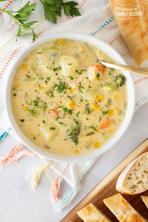 Creamy Vegetable Soup is a simple and delicious meal your family will love! Packed with broccoli, cauliflower, carrots, potatoes and tons of flavor. Easy Chicken Soup Recipe, Broccoli Cauliflower Carrots, Slow Cooker Chicken And Rice, Creamy Vegetable Soup, Chicken Soup Recipes Easy, Easy Chicken Soup, Carrots Potatoes, Chicken And Rice, Rice Soup