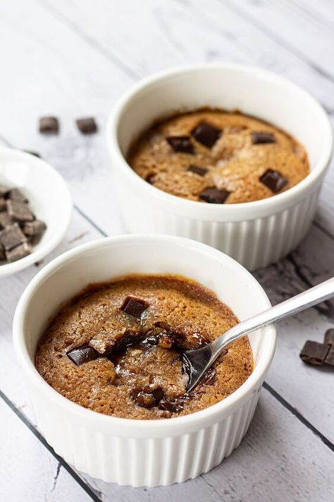 · Print RecipeIf you want a warm, chocolatey, and irresistibly gooey dessert without the hassle these half baked cookie dough puddings are for you. They just require 10 minutes of simple prep and another 10 minutes in the oven. Stand mixers and electric whisks are not required. After you've enjoyed your warm chocolatey gooey pot of heaven, you'll just be left with a mixing spoon and a couple of bowls to wash up.Half-baked cookie dough puddings are a great make-ahead dessert. Perfect if… Cookie Dough Desserts, 10 Minute Meals, Chocolate Fondant Cake, Simple Desserts, Gooey Chocolate Chip Cookies, Raw Cookie Dough, Gooey Cookies, Quick Cake, Frozen Cookie Dough