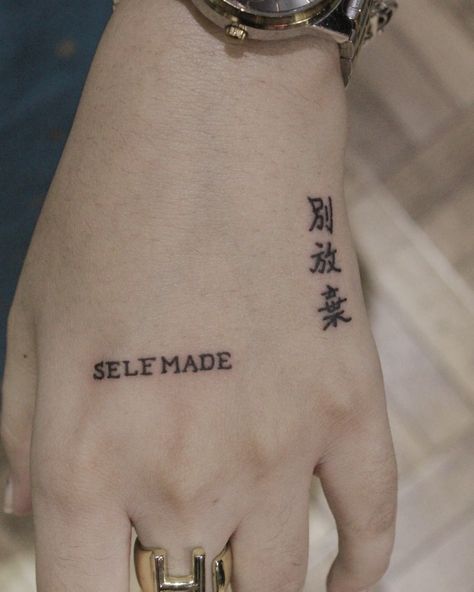 Check out this small tattoo ideas #selfmade #chinesesymbols ___________________________ Artist - Swapnil vijaywargiya STUDIO- @swapniltattoostudiobhopal #bhopal #india For bookings - (8109246030). ________________________________ #tattooing #tattooart #quotetattoo #quotetattoos #selfmadetattoo #symbolstattoo #blacklove #chinesesymboltattoo #handtattoo #sexytattoo #linework #meaningfultattoos #tattoolover #inked #inkedup #inkedlife #wherebhopalgetstattoo #wherebhopalgetsinked #insta #insta Chinese Tattoo Hand, Tato Tangan Aesthetic, Selfless Tattoo, Self Improvement Tattoos, Selfmade Tattoos, Self Made Tattoo, Meaning Tattoos, Chinese Symbol Tattoos, Power Tattoo