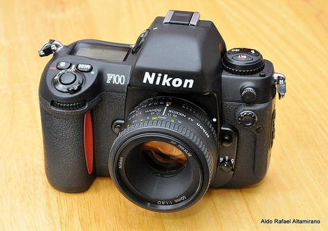 Nikon F100. On its way to me right now. Super excited to start learning film. Nikon Film Camera, Nikon F100, Canon Camera Models, Classic Road Bike, Nikon Digital Camera, Nikon D7200, Photo Lens, Photo Gear, Old Cameras