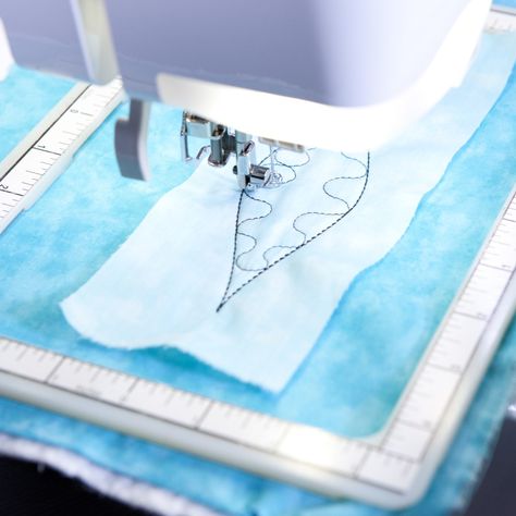 You don't need a longarm quilting machine to finish your quilt — stitch it with an embroidery machine instead! By quilting in the hoop, you can create quilts block by block, in long strips or stitch 'em whole. And with all the options your embroidery machine has, you can make quilts as simple or… Quilting In The Hoop, Large Embroidery Hoop, Prairie Points, Modern Quilting Designs, Machine Quilting Patterns, Embroidered Quilts, Novelty Fabric, Machine Quilting Designs, Quilt As You Go