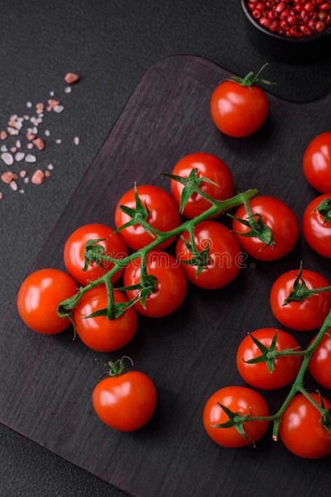 Delicious fresh cherry tomatoes on a twig with spices and herbs royalty free stock photography Cherry Branch, Fresh Cherry, Concrete Background, Fresh Cherries, Spices And Herbs, Stock Photography Free, Icon Set Vector, Cherry Tomatoes, Icon Set