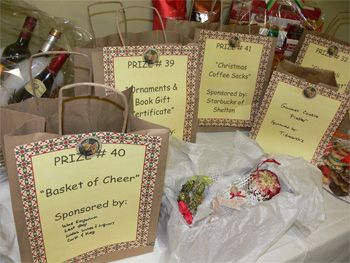 Some of the raffle ticket bags for prizes at the Echo Hose Hook & Ladder Company’s fifth annual Festival of Trees. (Photos by Brad Durrell) Raffle Prize Table Display, Raffle Boxes For Tickets Diy, Raffle Ticket Box Ideas, Raffle Table Display Ideas, Rose Banquet, Ffa Fundraiser, Foster Closet, Bingo Ideas, Benefit Ideas