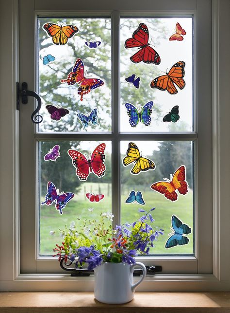 PRICES MAY VARY. Brighten up your day when you decorate with these fun butterfly window clings from Iconikal! No tape or gummy adhesives needed; these reusable and removable clings will cling to most non-porous surfaces such as glass, metal, vinyl, sealed tile, and more! Stick on your car windows, decorate the school bus, throw them on your locker or filing cabinet, decorate your home - the sky's the limit! Butterflies measure between 2 to 4 inches (2"-4") on the longest part Each sheet measures Classroom Themes Butterfly, Butterfly Class Decoration, Insects Classroom Decorations, Classroom Decor Butterflies, Monarch Butterfly Stained Glass Window, Metal Vinyl, Garden Boxes Raised, Window Decorations, Static Cling