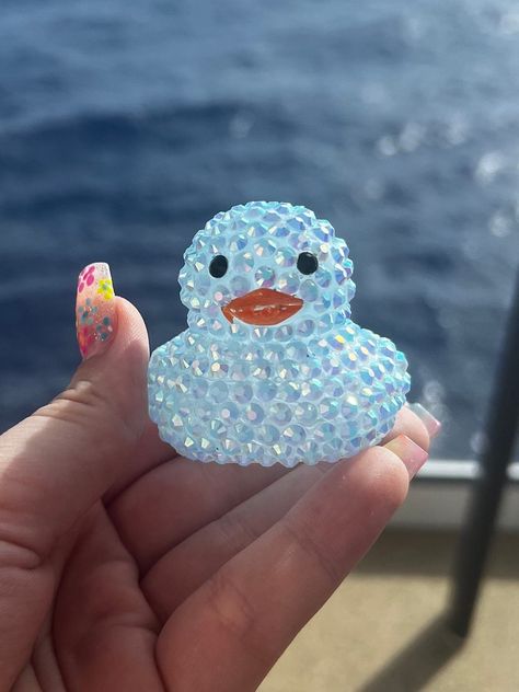 You'll love this rhinestoned rubber duck that can be used as decoration or hidden on cruises or jeeps. This rubber duck was made using 4mm rhinestones and E6000 glue. As a cruise-goer, one of my favorite parts of the cruise is hiding and finding ducks. For my previous cruise I decided to go the extra step and bling out all of my ducks. Not only did the other cruise-goers love these ducks but the staff went crazy for them too. These ducks are great for bringing a little extra joy in someone's day Jeep Ducks, Bling Ideas, Rhinestone Projects, Lucky Duck, Rubber Ducks, Things To Do When Bored, Rhinestone Art, Mini Things, Rubber Ducky