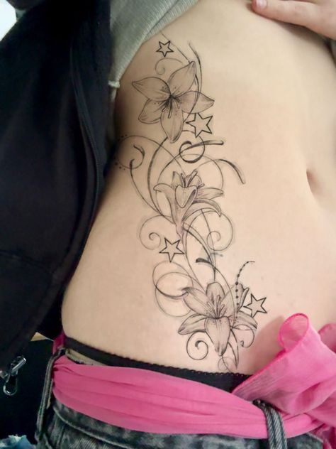 Side Ab Tattoos Women, Stomach Tattoos Women Flowers, Ethereal Matching Tattoos, Whimsical Stomach Tattoo, Wrap Around Tramp Stamp, Flower Tattoo Upper Thigh, Flower Belly Tattoo, Side Tatoos Woman, Women Pelvic Tattoo