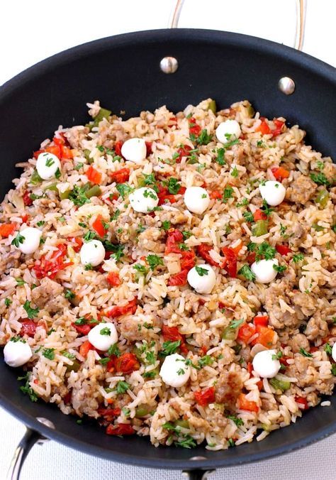 This Italian Fried Rice recipe is perfect for feeding a crowd at parties, or your family for dinner! #friedrice #ricerecipe #dinnerrecipe Recipes With Italian Sausage Links, Italian Fried Rice, Pasta With Onions, Sausage Jambalaya Recipe, Italian Fries, Cheese Dumplings, Dirty Rice Recipe, Sausage Recipes For Dinner, Traditional Italian Food