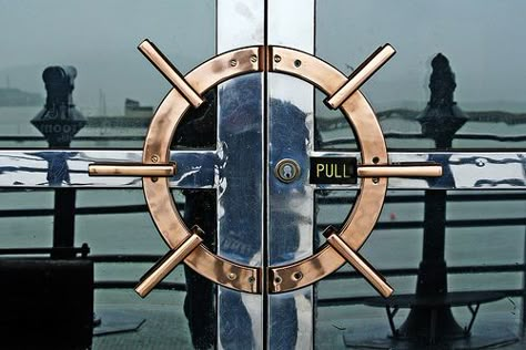 Nautical door handles with ship wheel design. Fisherman's Wharf, San Francisco, CA. #doors #shipwheels Nautical Theme Restaurant, Ship Restaurant, Ship Interior Design, Nautical Door, Nautical Restaurant, Nautical Restaurant Design, Ship Interior, Seafood Decor, Ship Wheel Decor