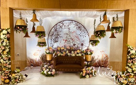 Customised bird themed stage adorned with pampas and hanging cane baskets . Yes ! Florals the added class to the entire decor. Concept, Design & Decor @uniquedecors_ek Mehendi Backdrop, Overhead Decor, Small Stage, Photobooth Ideas, Cane Baskets, Backdrop Decor, Stage Decor, Stage Backdrop, Wedding Stage Decorations