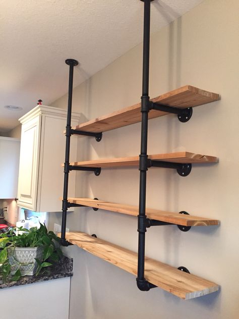 HGTV pipe shelving ! Rigid Pipe Shelves, Black Pipe Wall Shelves, Shelves With Pipes Industrial Style, Iron Rod Shelves, Shelves Made From Pipes, Pvc Pipe Shelves, Industrial Piping Shelves, Pipe And Wood Shelves, Pipe Shelves Diy