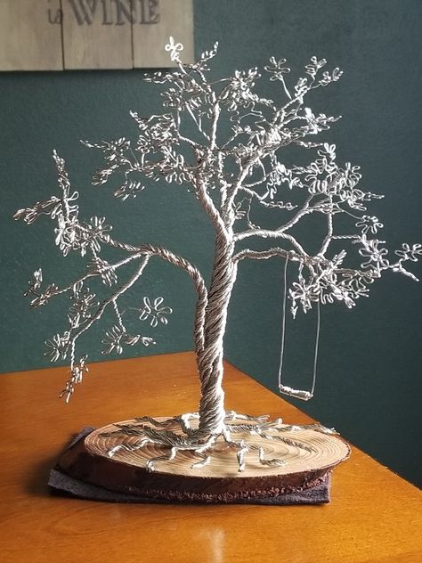 Copper colored wire tree on wood base. Tree Made Out Of Wire, Wire Art Tree, Wire Trees With Beads, Copper Wire Crafts Diy, Wire Trees Diy How To Make, Beaded Wire Art, Copper Wire Tree, Copper Wire Crafts, Wire Bonsai