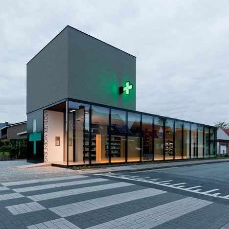 "Pharmacy M was recently completed by Belgian studio Caan Architecten and is situated on the site of a former farm in the outskirts of Ghent." Dentistry Clinic, Pharmacy Decor, Retail Facade, Retail Architecture, Urban Design Concept, Shop Facade, Storefront Design, Pharmacy Design, Clinic Design