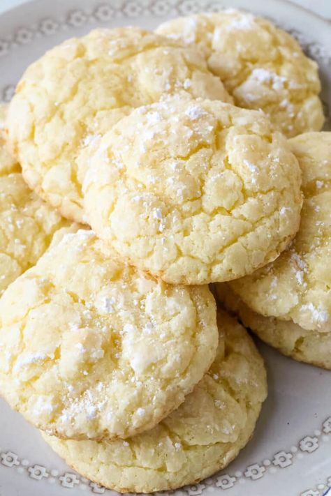 These Gooey Butter Cookies are made with a yellow cake mix, butter, cream cheese, eggs, and vanilla. Chewy and delicious, these 5-ingredient cake mix cookies are such a quick and easy cookie recipe for any season! Cookie Recipes Gooey, Ooey Gooey Butter Cookies, Butter Cake Cookies, Chocolate Cake Mix Cookies, Boxed Cake Mixes Recipes, Gooey Butter Cookies, Gooey Butter, Loaf Cakes, Gooey Cookies