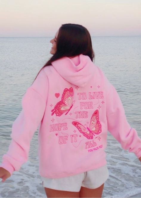 The "To Live For the Hope of it All" Oversized Hoodie is crafted from top-quality fabrics, while having an exquisite embroidery art of fine-detailed butterflies. The PPP palm embroidered above our hearts is a symbol of unity within the Pink Palm Puff community, reminding us all of the love we share. Puff Hoodie, Hawaii Hibiscus, Butterfly Graphic, Back Day, Swim Sets, Lingerie Dress, The Hope, Oversized Hoodie, Pink Hoodie